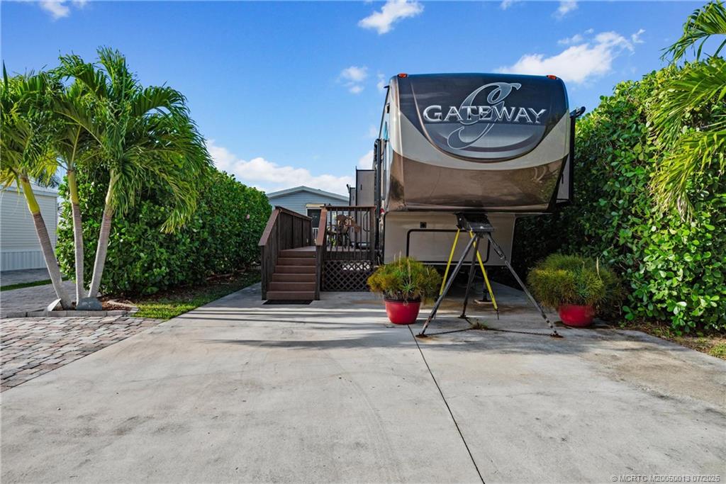 Undisclosed Address Jensen Beach, FL 34957 - Photo 21 of 47 a sign that is on a brick wall