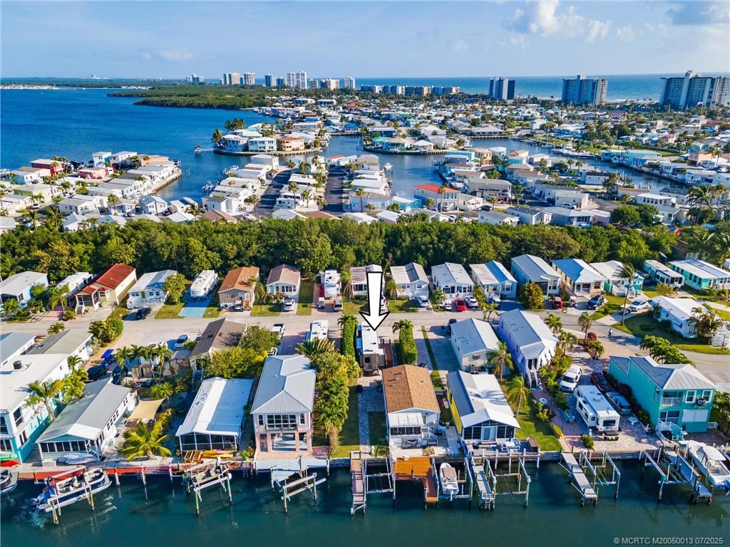 Undisclosed Address Jensen Beach, FL 34957 - Photo 25 of 47 an aerial view of multiple house