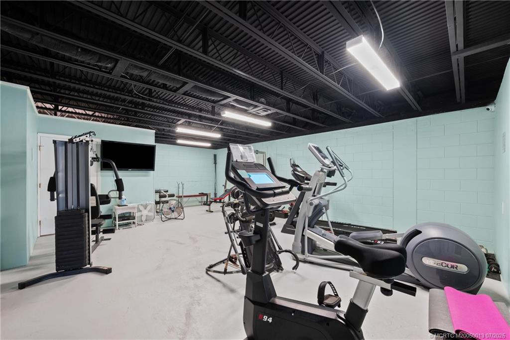 Undisclosed Address Jensen Beach, FL 34957 - Photo 30 of 47 a view of a room with gym equipment