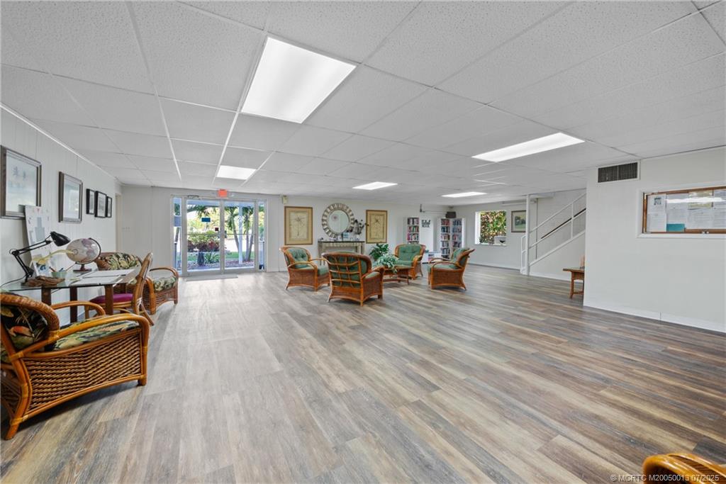 Undisclosed Address Jensen Beach, FL 34957 - Photo 37 of 47 a living room with furniture and a wooden floor