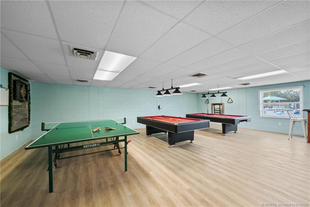 Undisclosed Address Jensen Beach, FL 34957 - Photo 40 of 47 a room with furniture and wooden floor