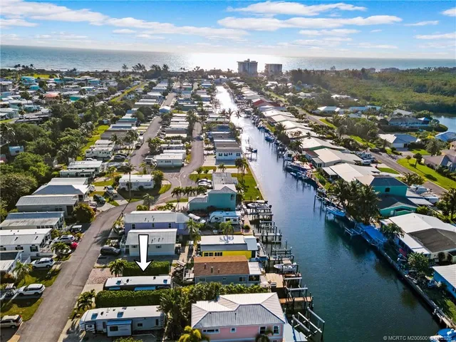 a view of a lake with a car parked