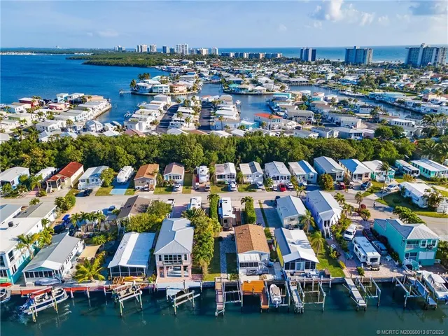 a view of a lake with a yard