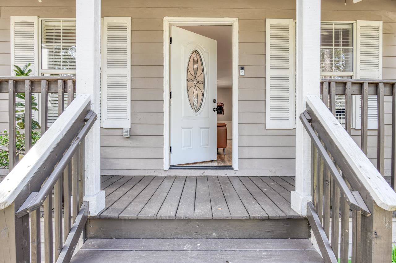 3335 Pacetti Road St. Augustine, FL 32092 - Photo 8 of 39 a view of a hallway with wooden floor and stairs