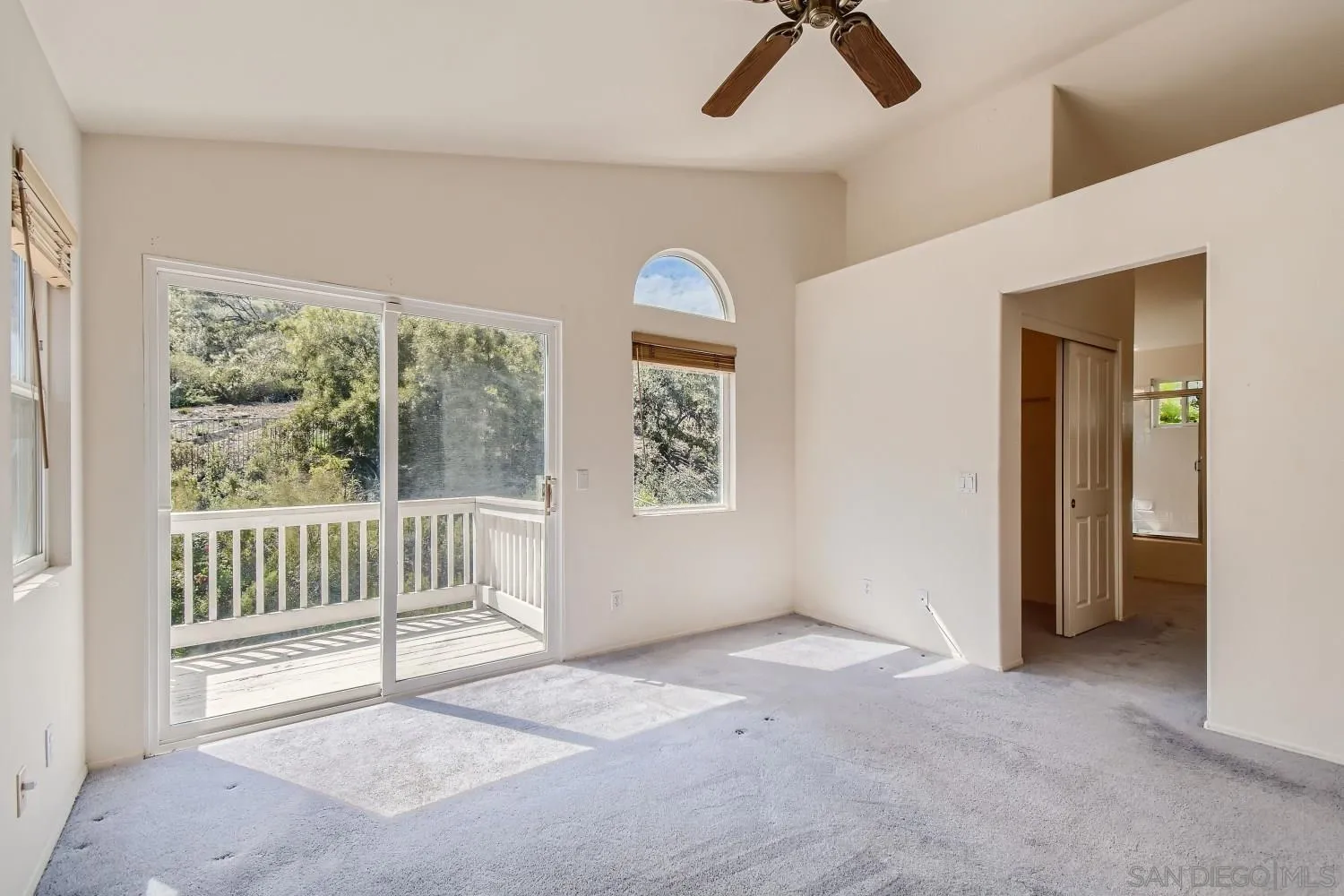 11756 Pickford Road San Diego, CA 92131 - Photo 15 of 26 an empty room with windows and fan