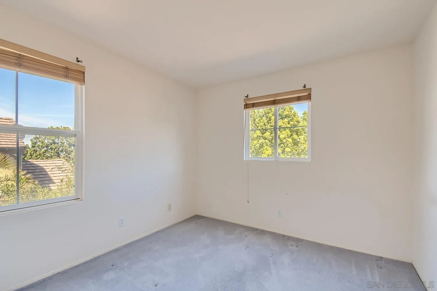 11756 Pickford Road San Diego, CA 92131 - Photo 19 of 26 an empty room with windows