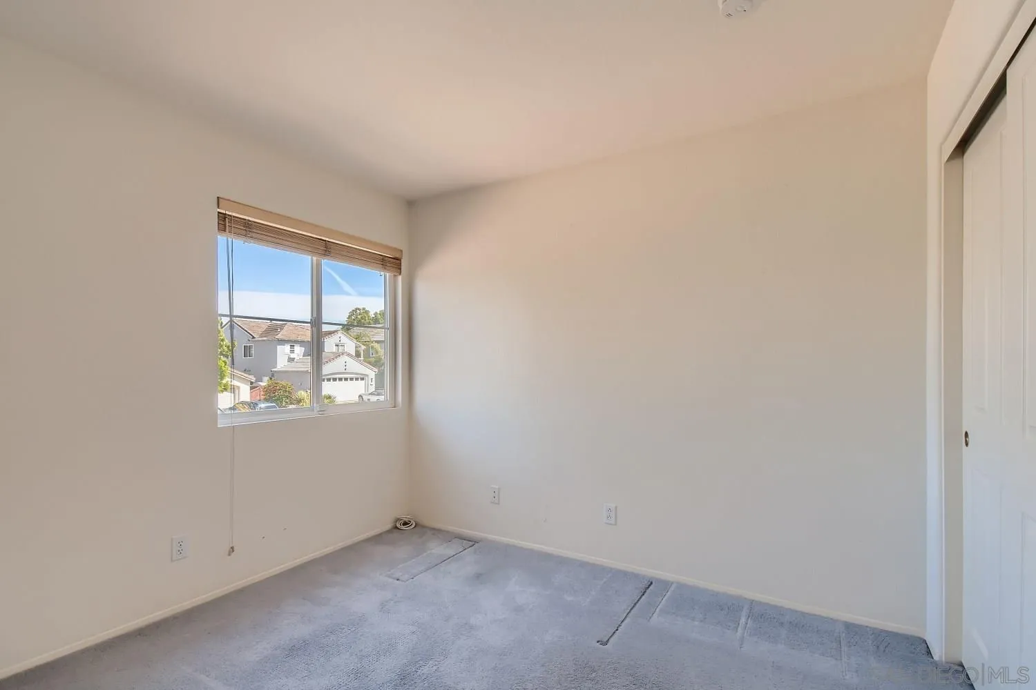 11756 Pickford Road San Diego, CA 92131 - Photo 20 of 26 an empty room with windows