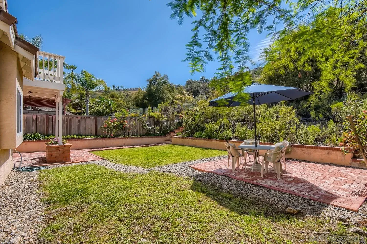 11756 Pickford Road San Diego, CA 92131 - Photo 23 of 26 a view of a backyard with sitting area