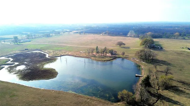 a view of a lake in middle of the town