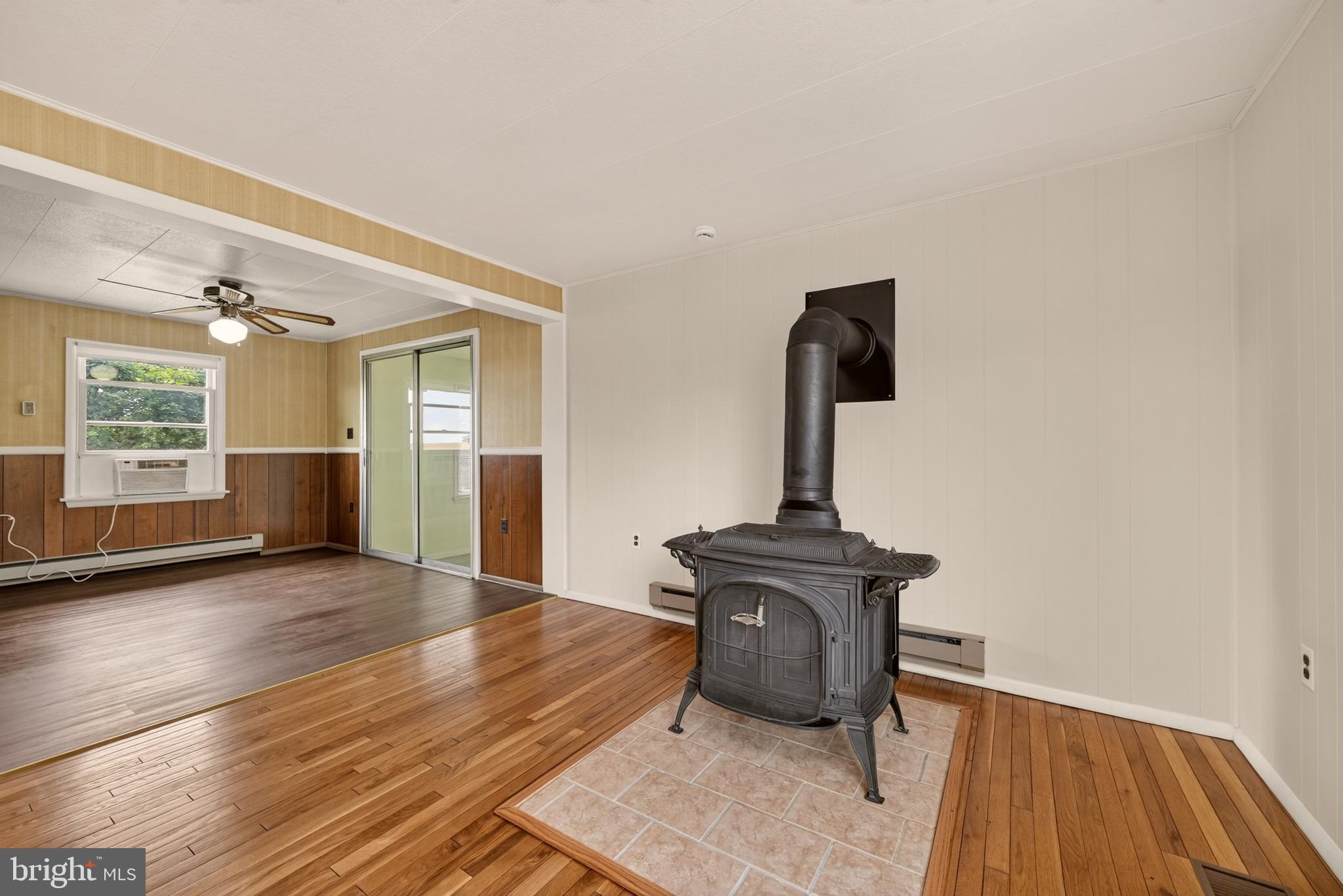 13835 Howard Road Dayton, MD 21036 - Photo 12 of 43 Living room with stove
