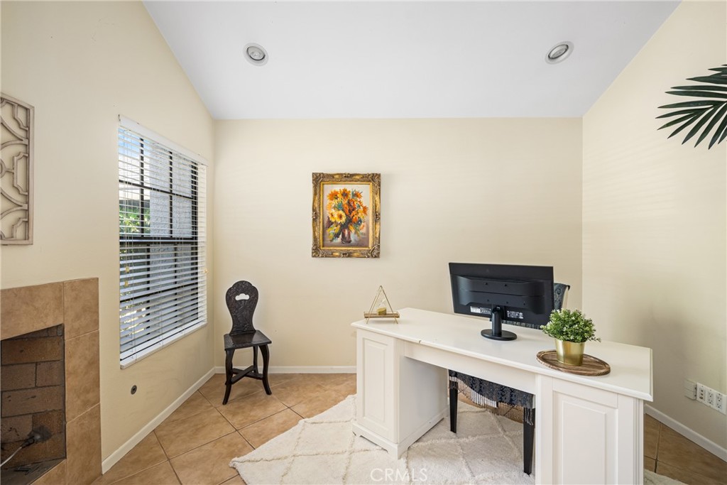 10 Brookstone Avenue Irvine, CA 92604 - Photo 11 of 67 a view of a workspace with furniture and a window