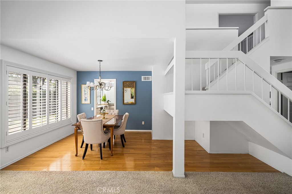 10 Brookstone Avenue Irvine, CA 92604 - Photo 16 of 67 a view of a livingroom with furniture window and wooden floor