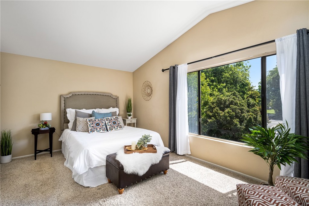 10 Brookstone Avenue Irvine, CA 92604 - Photo 34 of 67 a bedroom with a large bed and a large window