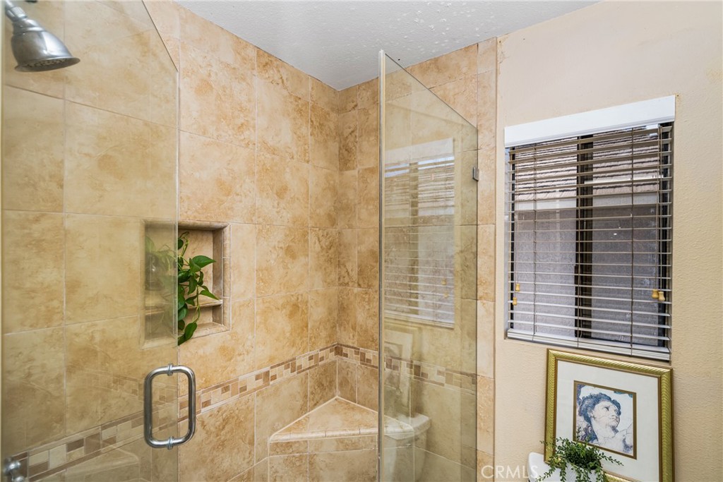 10 Brookstone Avenue Irvine, CA 92604 - Photo 37 of 67 a bathroom with a shower