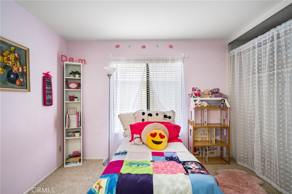 10 Brookstone Avenue Irvine, CA 92604 - Photo 38 of 67 a bedroom with a bed and a window