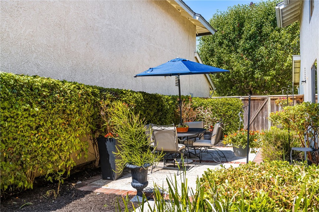 10 Brookstone Avenue Irvine, CA 92604 - Photo 47 of 67 a view of backyard with seating space and plants
