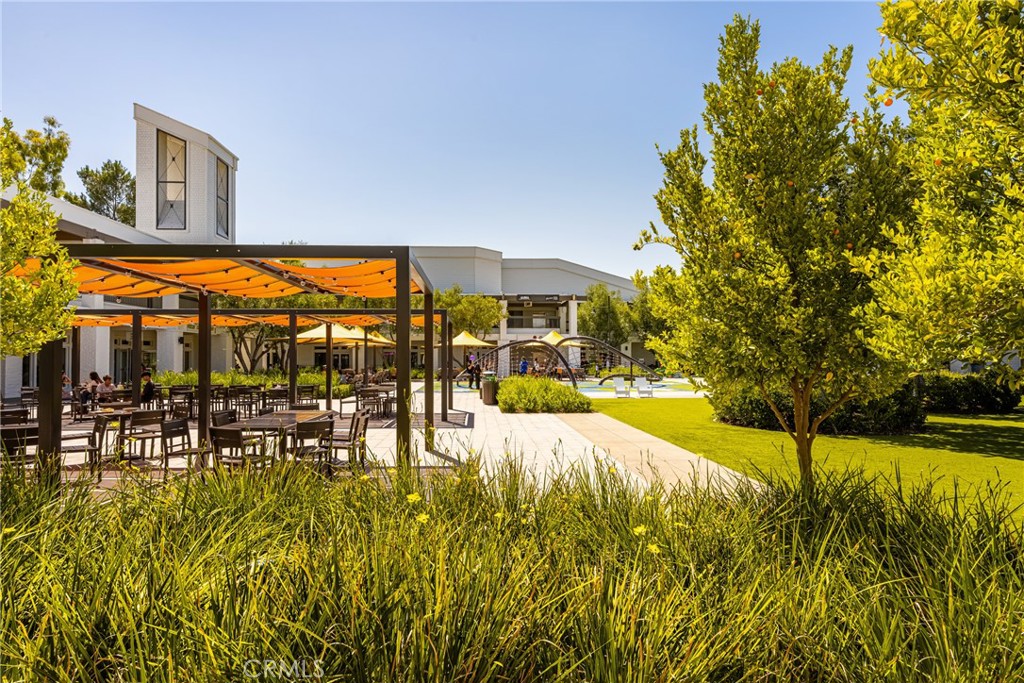 10 Brookstone Avenue Irvine, CA 92604 - Photo 60 of 67 a swimming pool with outdoor seating and yard