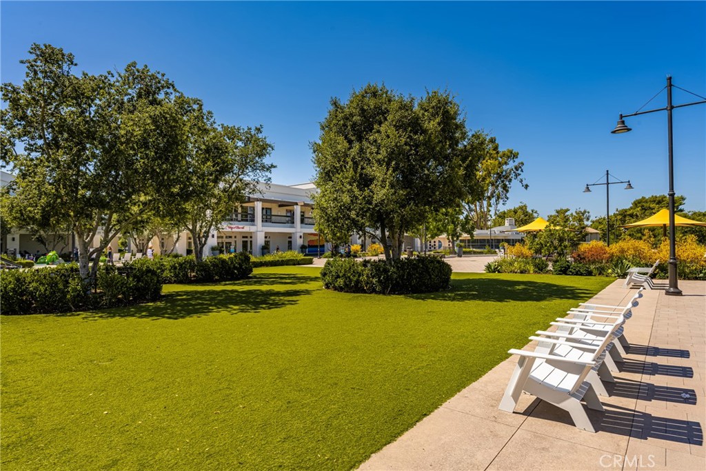 10 Brookstone Avenue Irvine, CA 92604 - Photo 61 of 67 a view of a swimming pool with a patio