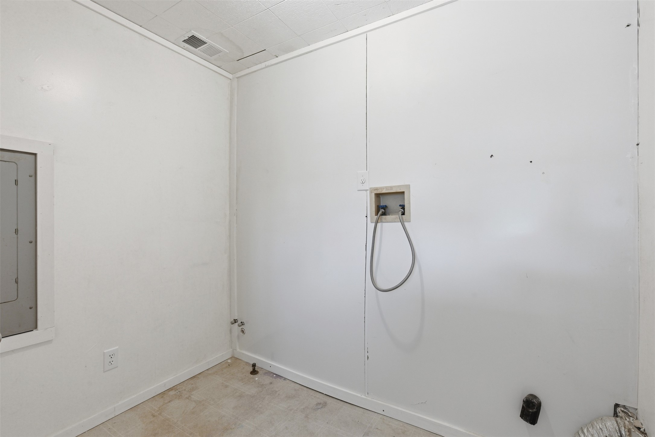 1310 Brazos Street Hempstead, TX 77445 - Photo 19 of 32 a bathroom with a glass shower door