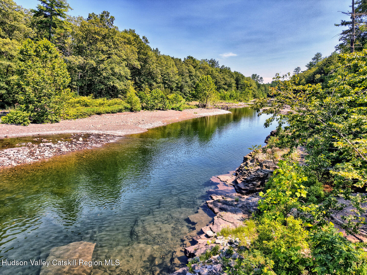 128 West Moorehouse Road Cairo, NY 12413 - Photo 11 of 132 a view of a lake with a mountain in the background