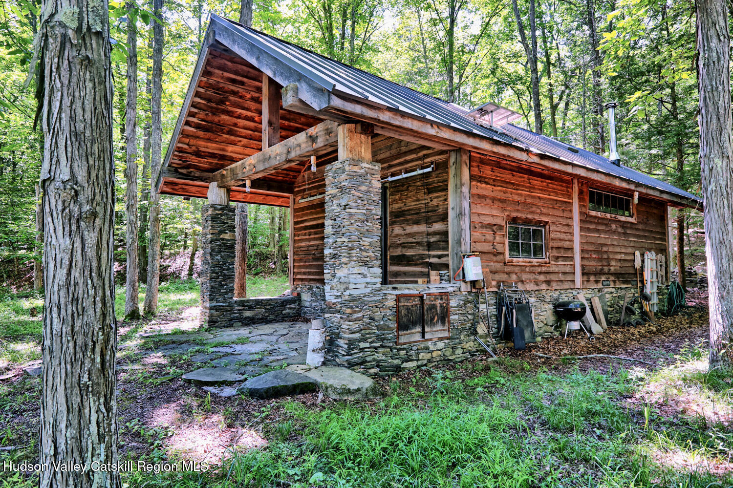 128 West Moorehouse Road Cairo, NY 12413 - Photo 28 of 132 a backyard of a house with seating space