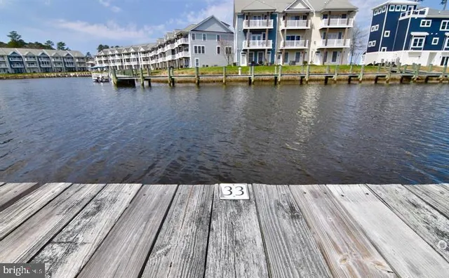 a view of swimming pool with outdoor seating and yard