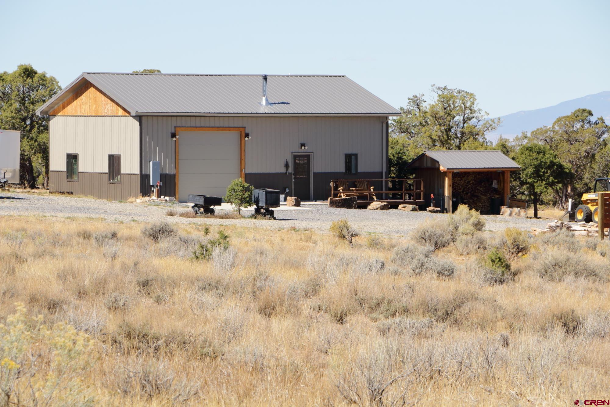 a view of a house with snow on the wall