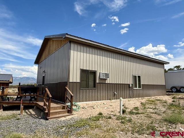 75707 B76 Road Crawford, CO 81415 - Photo 17 of 44 a view of a house with wooden roof