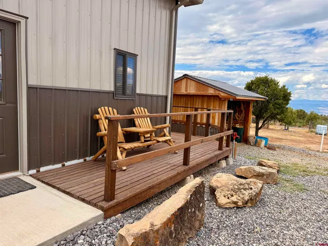 a view of a two chair in the patio
