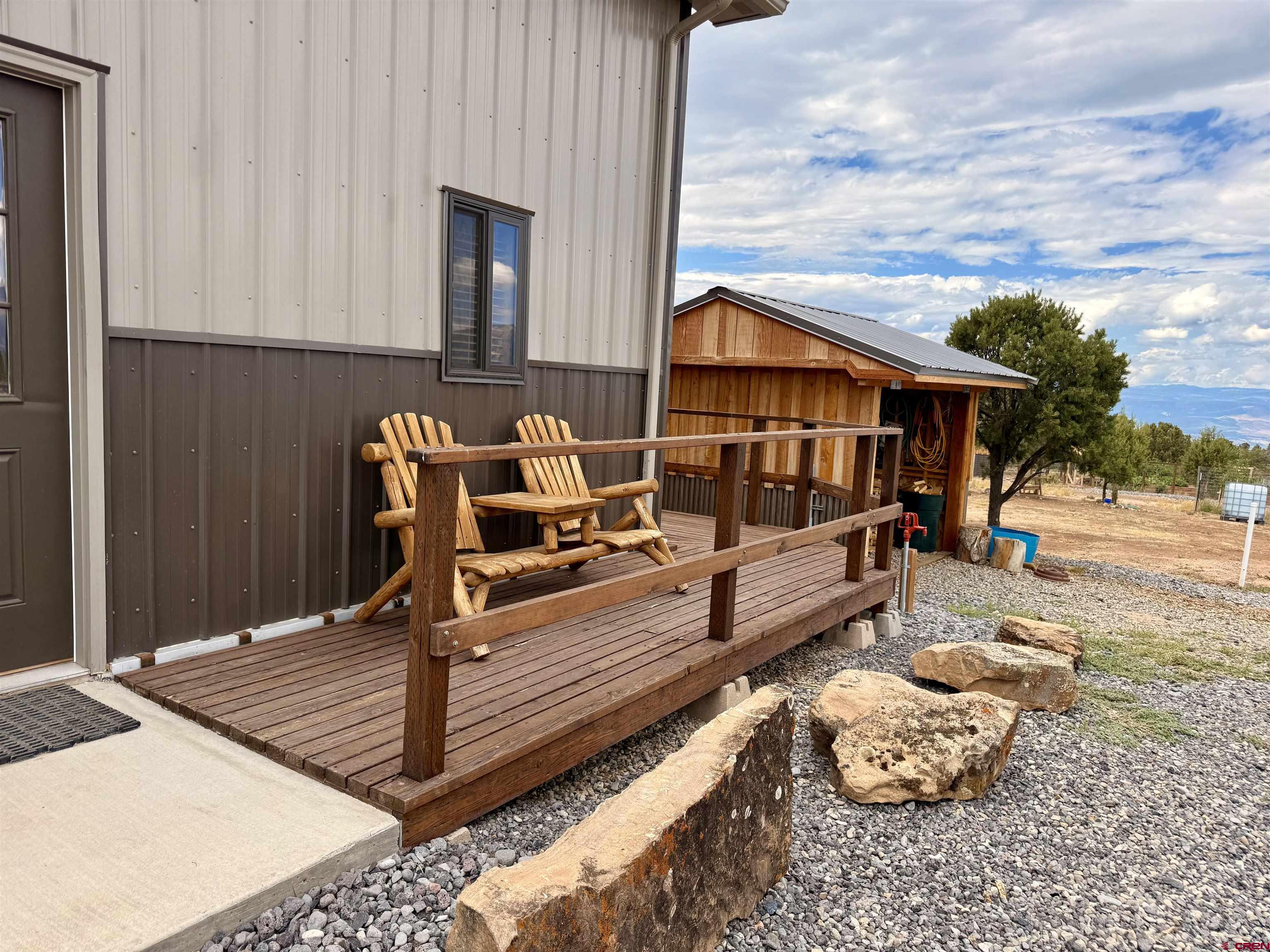 75707 B76 Road Crawford, CO 81415 - Photo 18 of 44 a view of a two chair in the patio