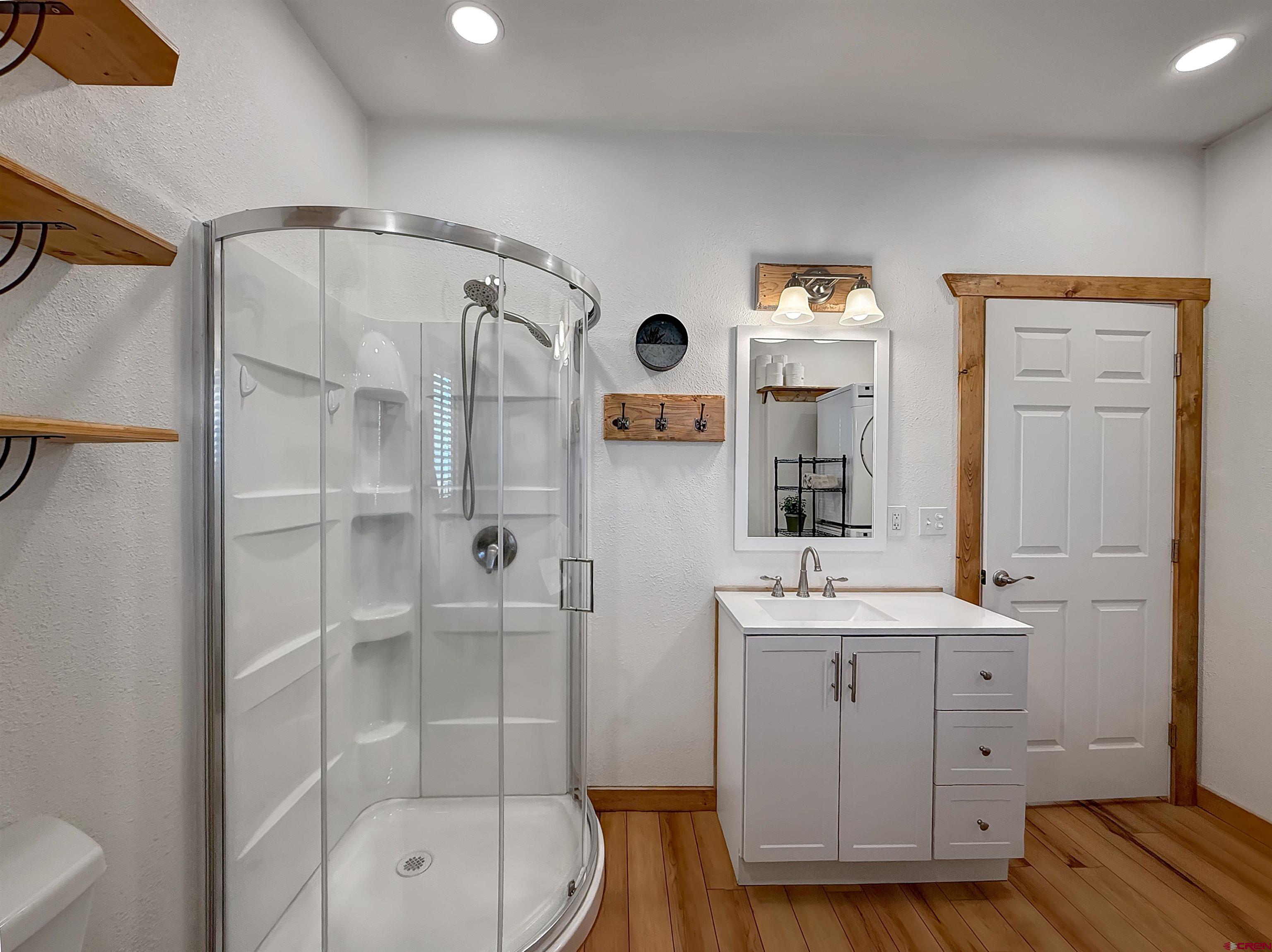 75707 B76 Road Crawford, CO 81415 - Photo 35 of 44 a bathroom with a sink a toilet and shower