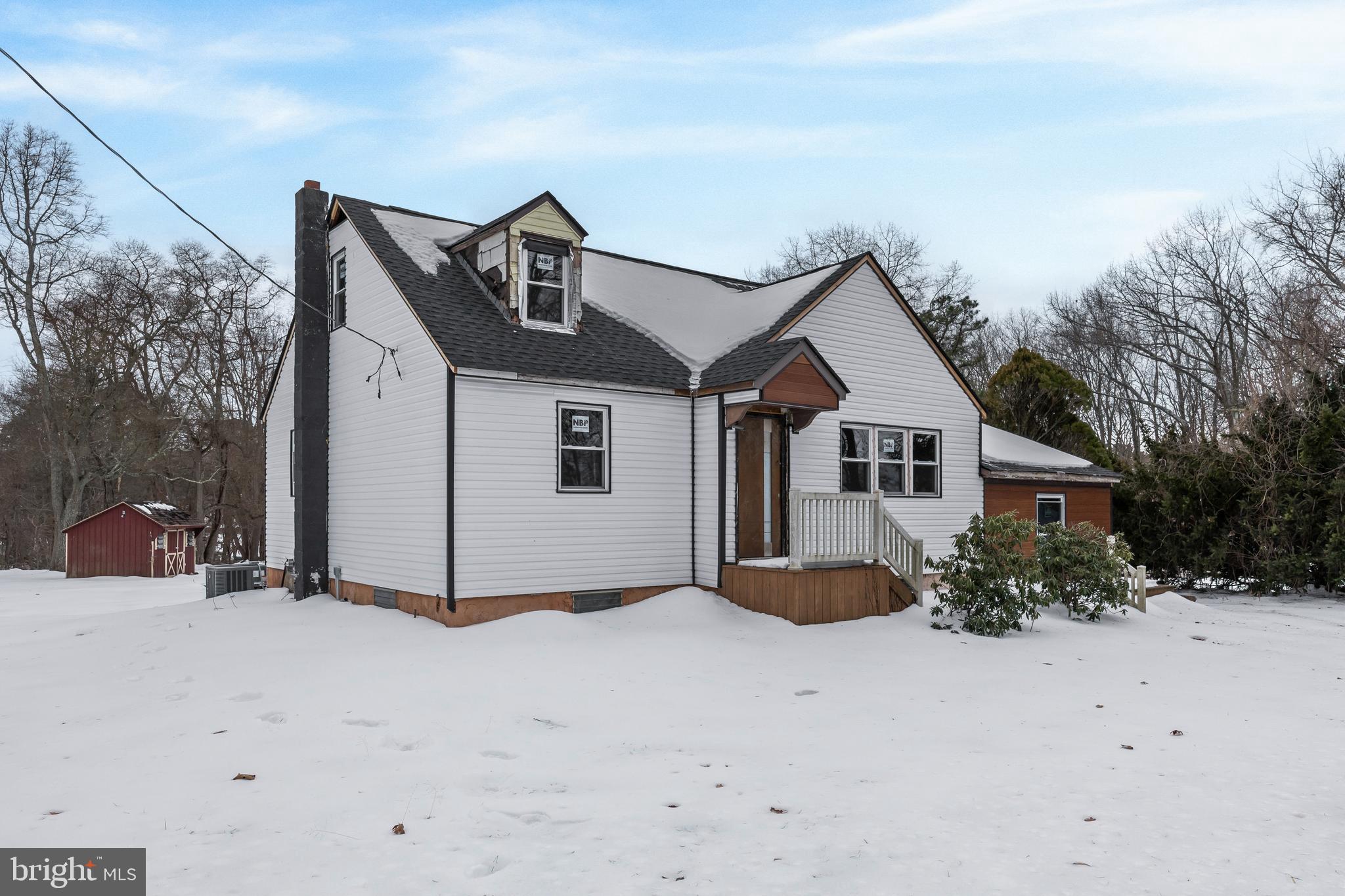 509 Hickstown Road Sicklerville, NJ 08081 - Photo 2 of 6 a front view of a house with a yard