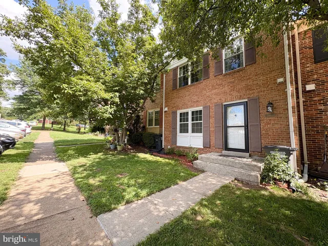 a picture of a bench in front of a window