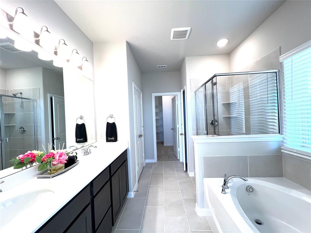 3305 Cross Shr Drive Anna, TX 75409 - Photo 18 of 31 Bathroom with separate shower and tub, tile patterned floors, and vanity