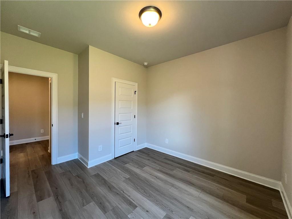 2969 Sweet Red Circle Braselton, GA 30517 - Photo 29 of 49 wooden floor in an empty room