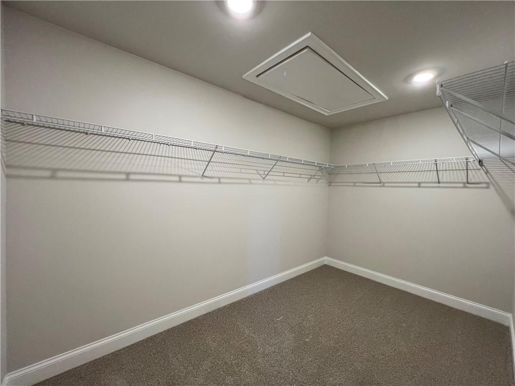 2969 Sweet Red Circle Braselton, GA 30517 - Photo 35 of 49 a view of a room with racks on the wall