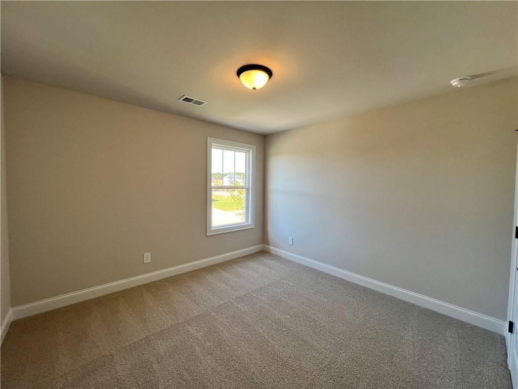 2969 Sweet Red Circle Braselton, GA 30517 - Photo 39 of 49 an empty room with a window