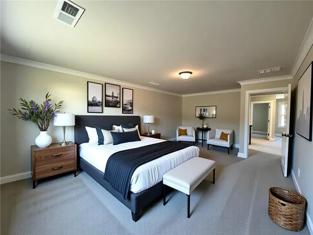 a spacious bedroom with a bed and lamp