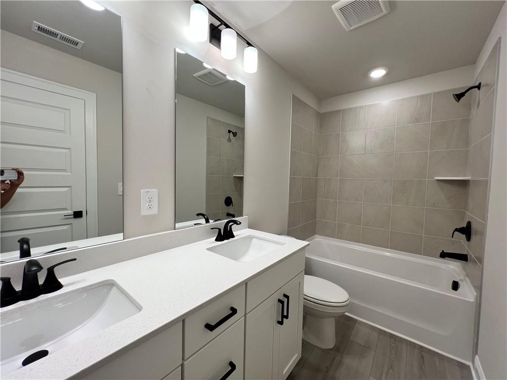 2969 Sweet Red Circle Braselton, GA 30517 - Photo 41 of 49 a bathroom with a sink a toilet and shower