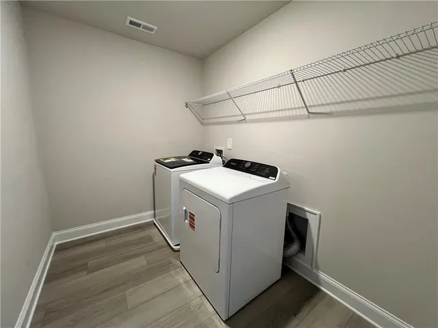 a view of a swimming pool with a yard