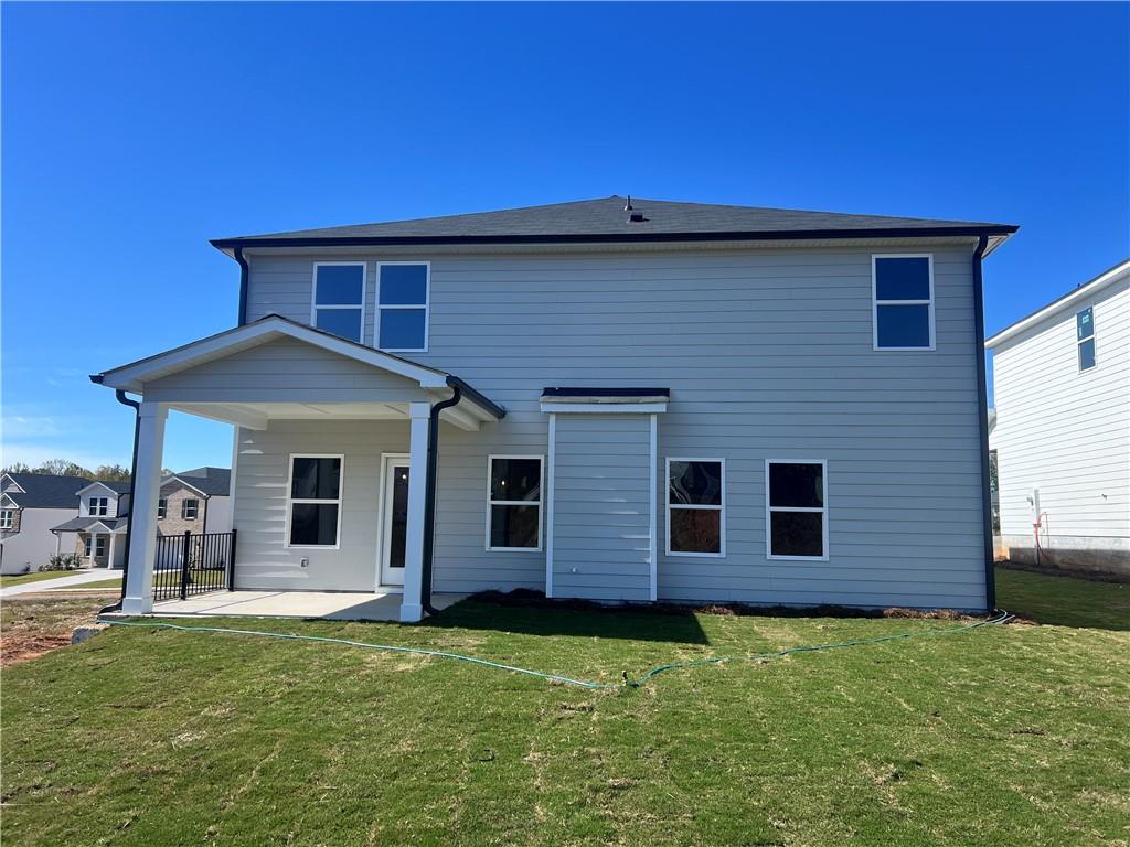 2969 Sweet Red Circle Braselton, GA 30517 - Photo 45 of 49 a front view of a house with garden