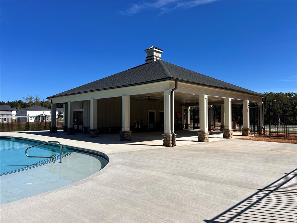 2969 Sweet Red Circle Braselton, GA 30517 - Photo 48 of 49 front view of a house with a patio