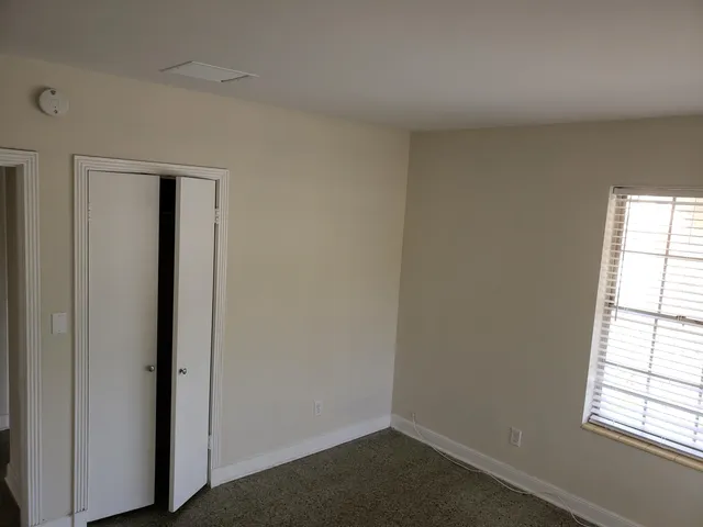 an empty room with windows