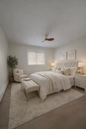 a spacious bedroom with a bed and a couch