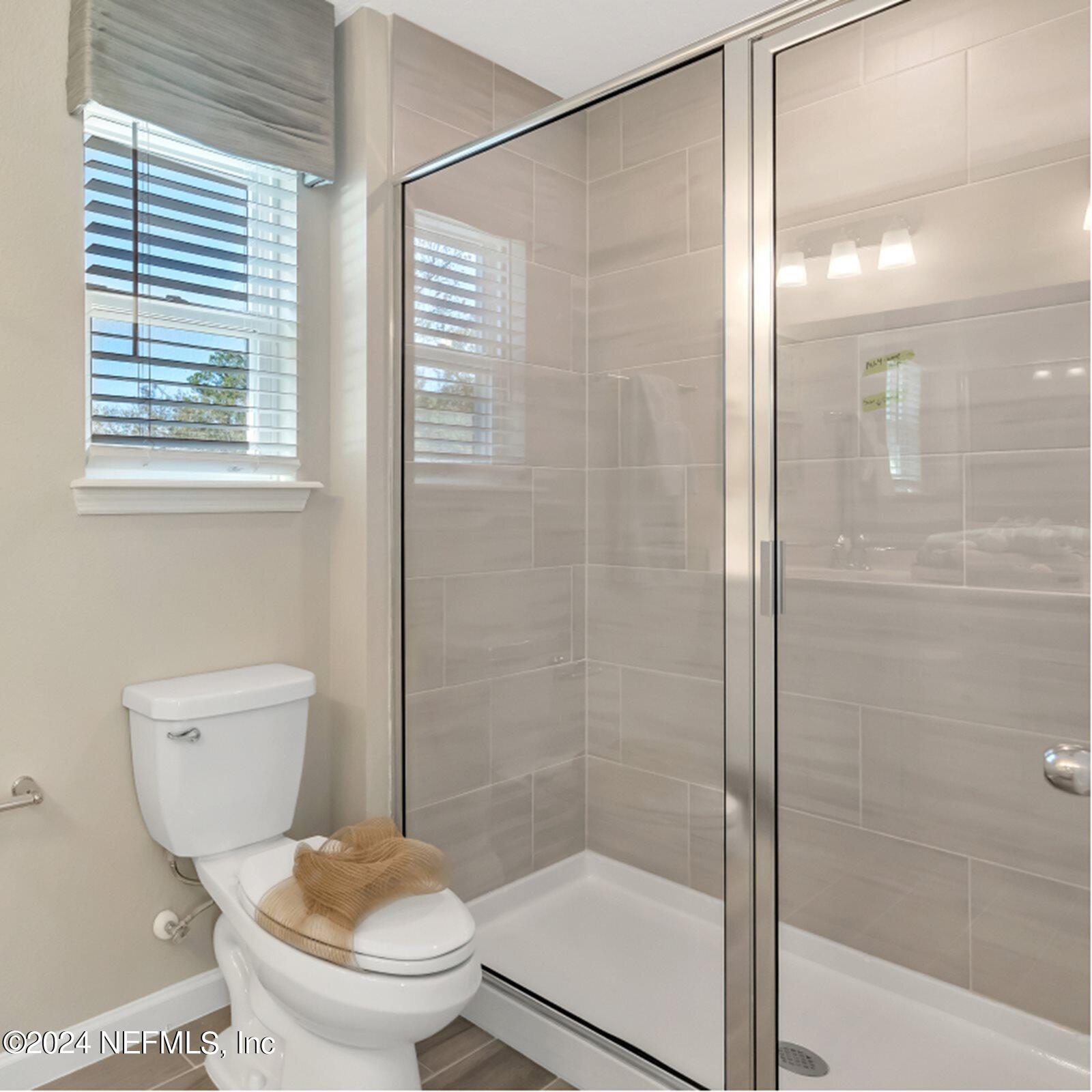 9163 Remy Court Jacksonville, FL 32211 - Photo 13 of 15 JAX_1781_Rend_Truman_OwnersBath1_F2