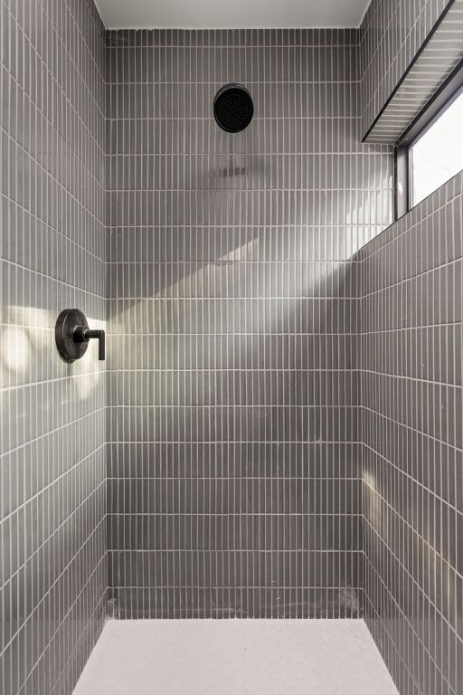 1603 Chelsea Lane, Unit 3 Austin, TX 78704 - Photo 21 of 40 Bathroom featuring tiled shower