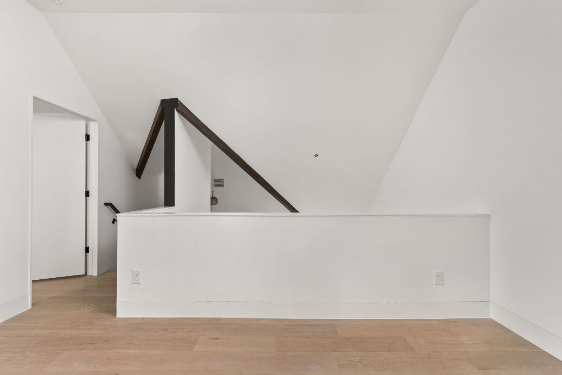 1603 Chelsea Lane, Unit 3 Austin, TX 78704 - Photo 31 of 40 Bonus room featuring lofted ceiling and light wood-style flooring