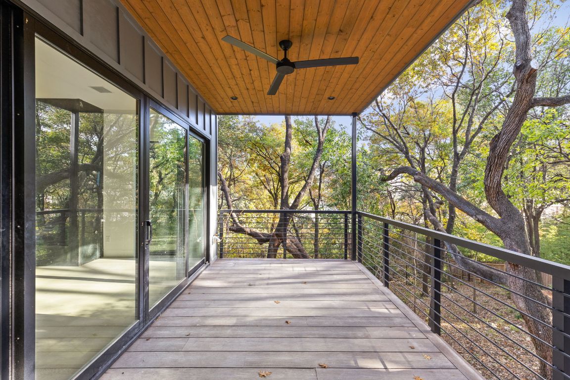 1603 Chelsea Lane, Unit 3 Austin, TX 78704 - Photo 33 of 40 Unfurnished sunroom with plenty of natural light