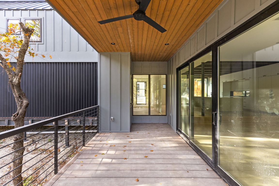 1603 Chelsea Lane, Unit 3 Austin, TX 78704 - Photo 36 of 40 Wooden deck with ceiling fan