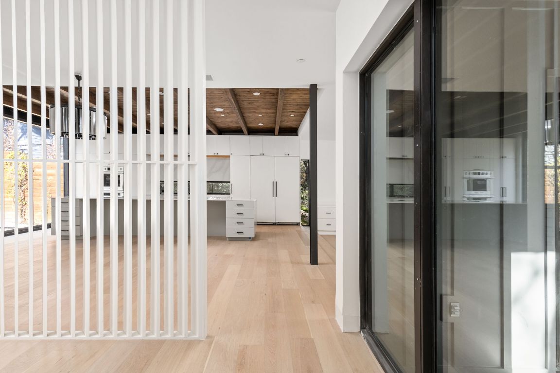 1603 Chelsea Lane, Unit 3 Austin, TX 78704 - Photo 6 of 40 Corridor with light wood-style flooring, a desk, recessed lighting, and wood ceiling